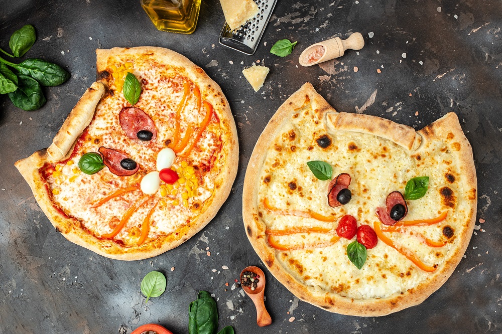 child making pizza