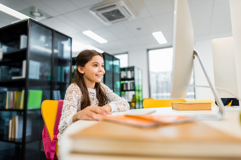 girl using computer