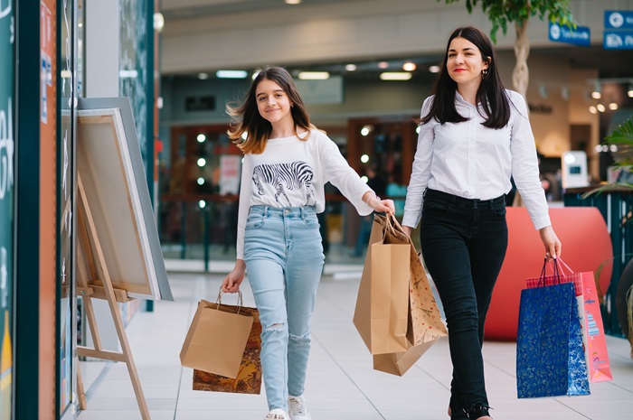 mom and teen shopping